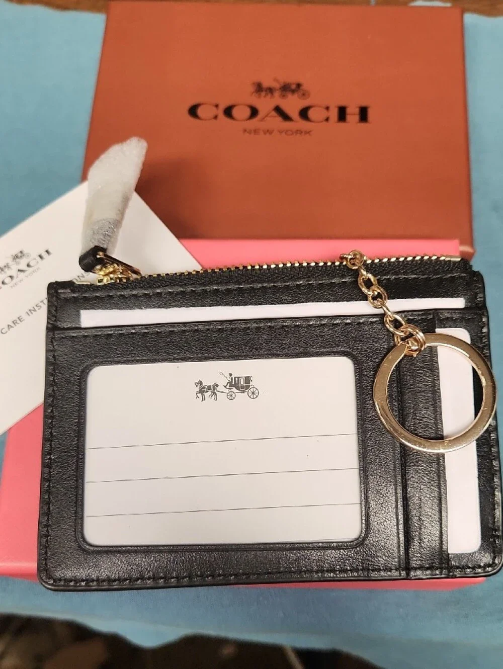 COACH Black Leather Zip Card Holder with Gold Logo
